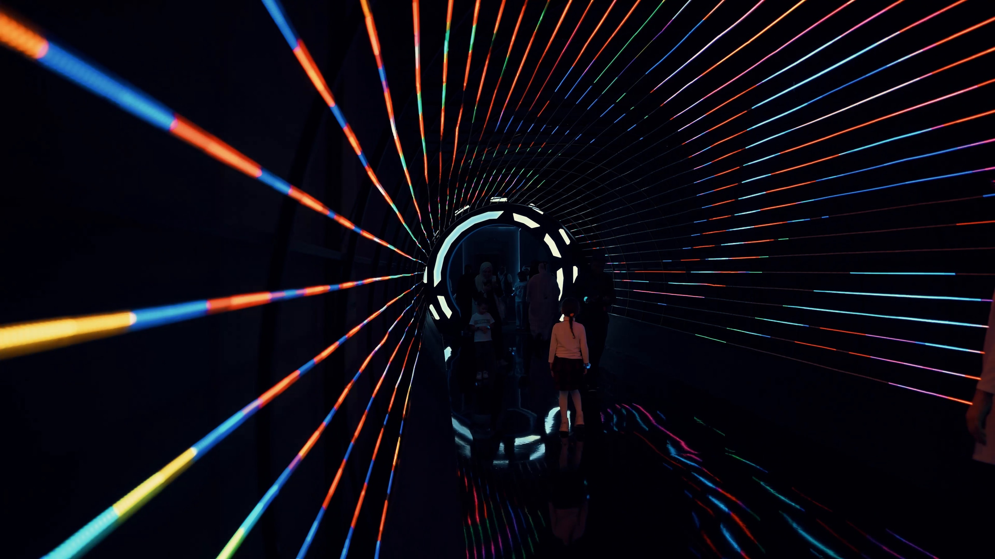 Tunnel of radiating coloured light