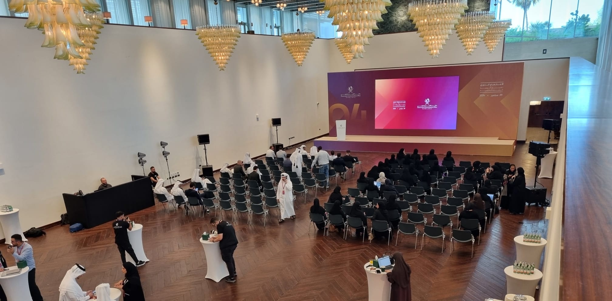Workshop hall with a stage screen and theatre-style seating