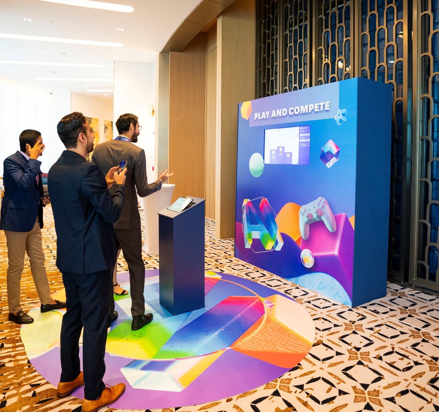 Guests at an interactive experience stand at Microsoft AI Tour Muscat