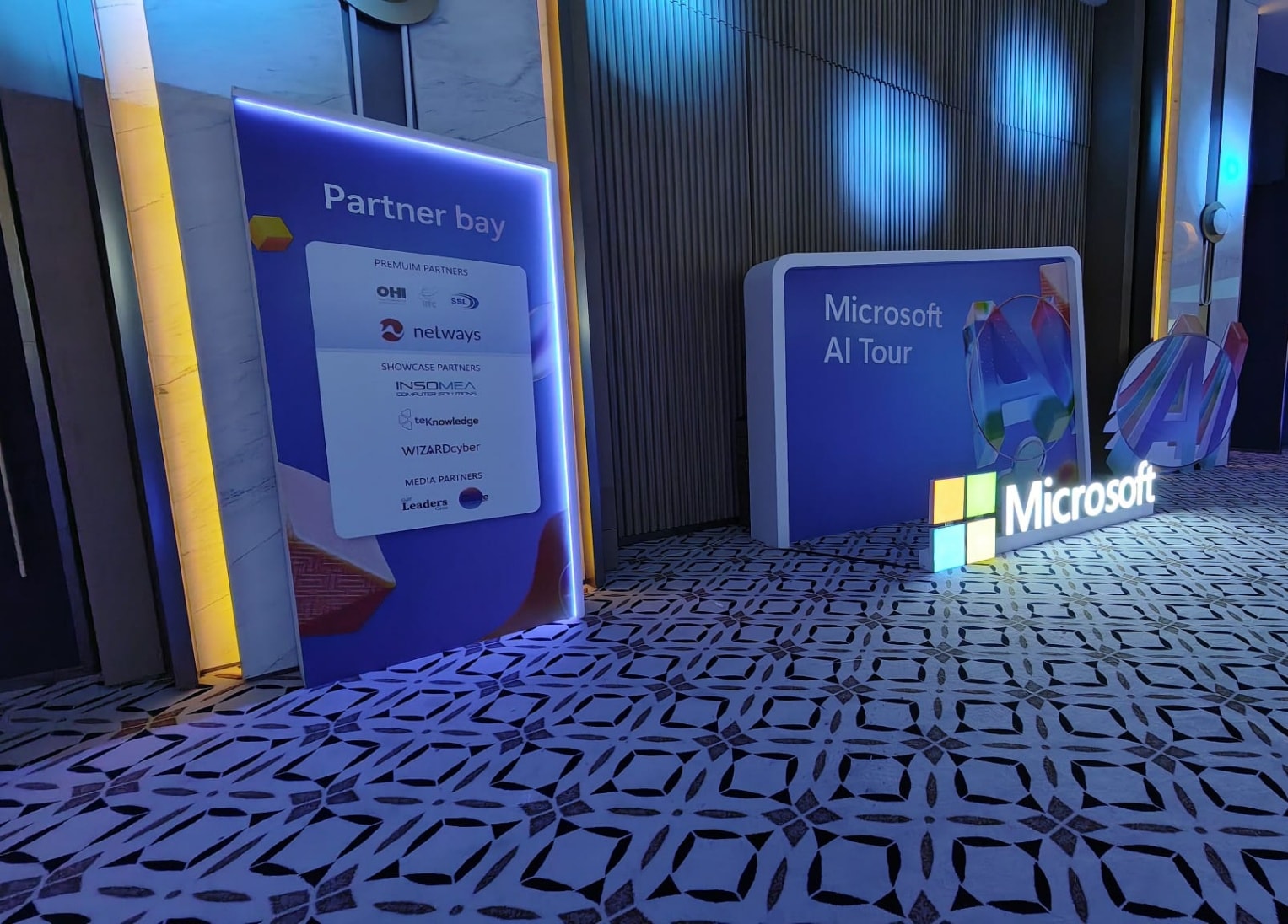 Partner bay signage and illuminated Microsoft logo