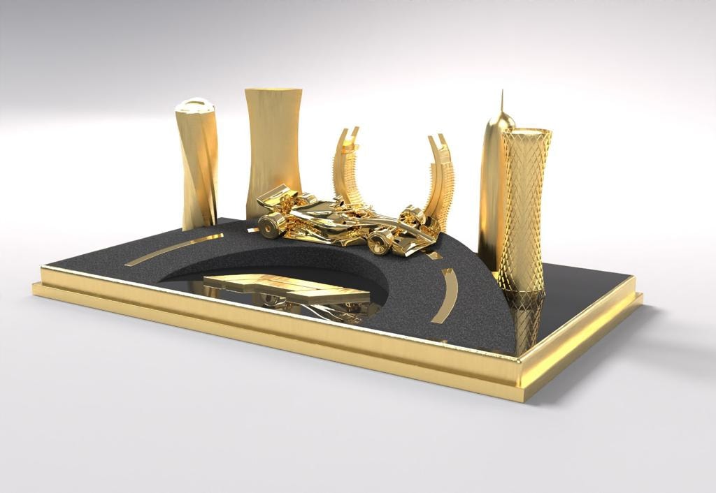 Gold Doha skyline on a black and gold plinth