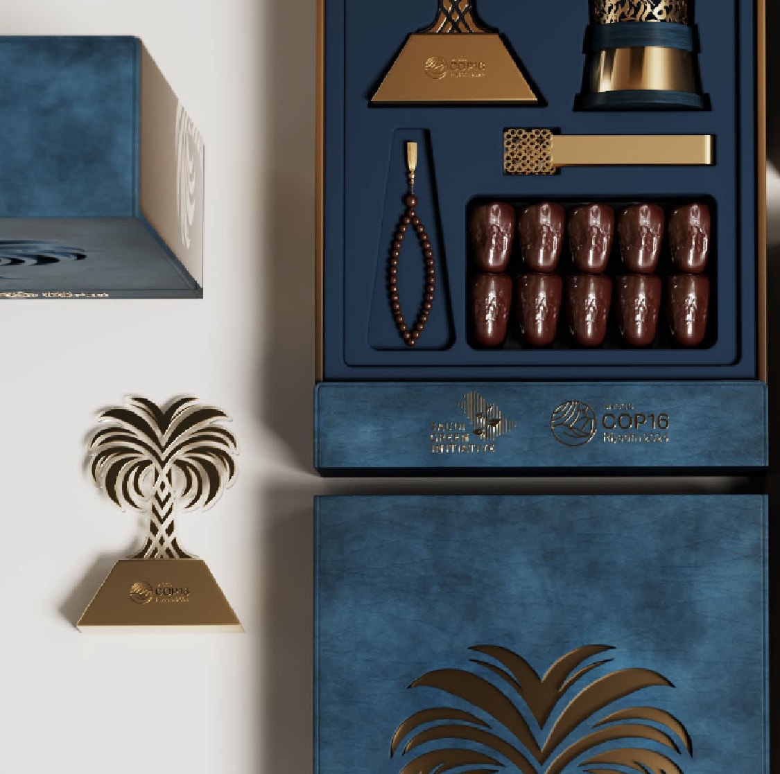 Blue gift box with gold palm motif and dates