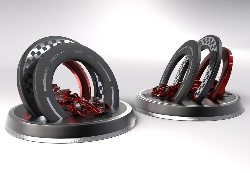 Tyre-shaped trophies with red racing cars