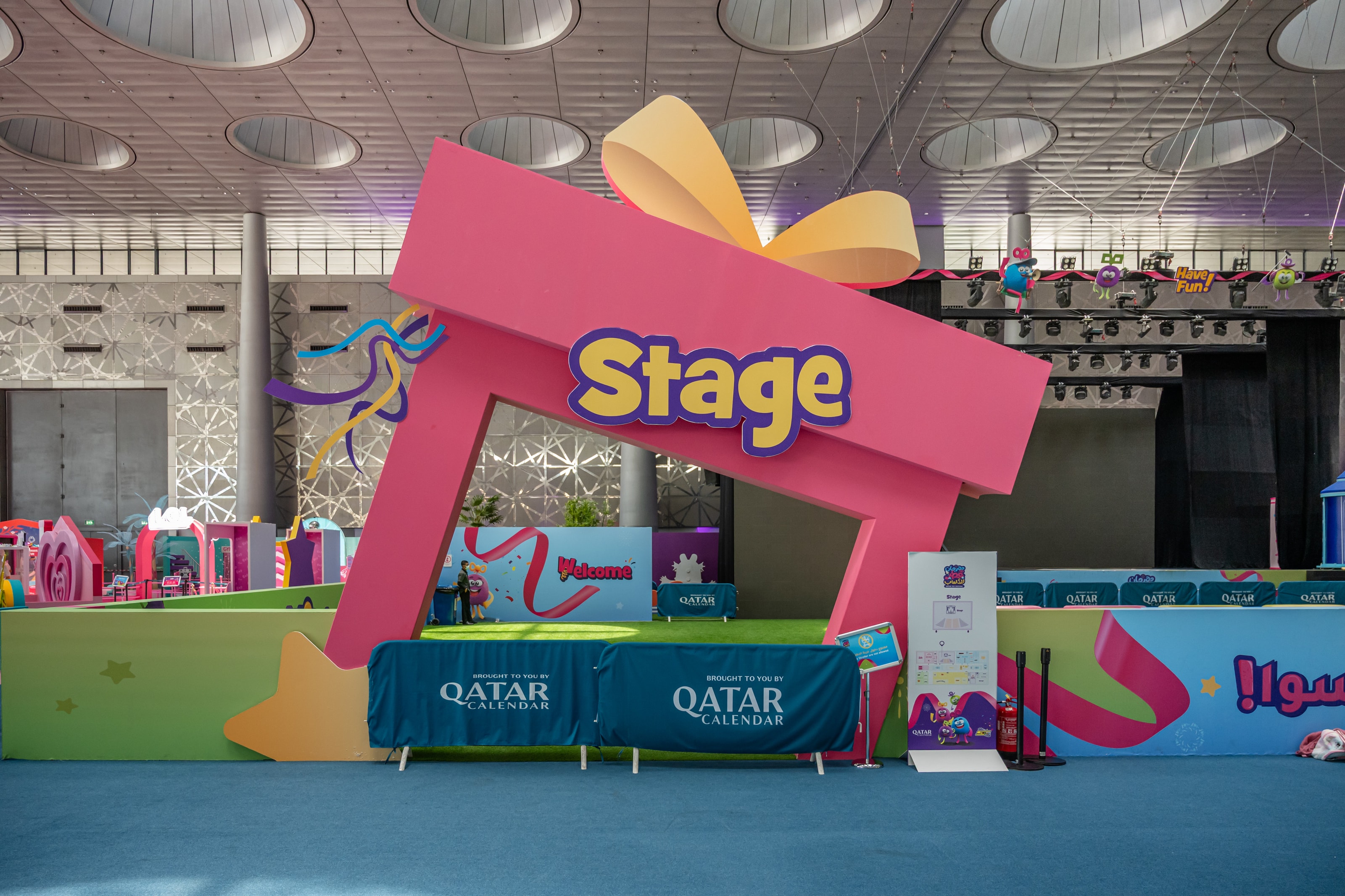 Gift-box arch marking the main stage
