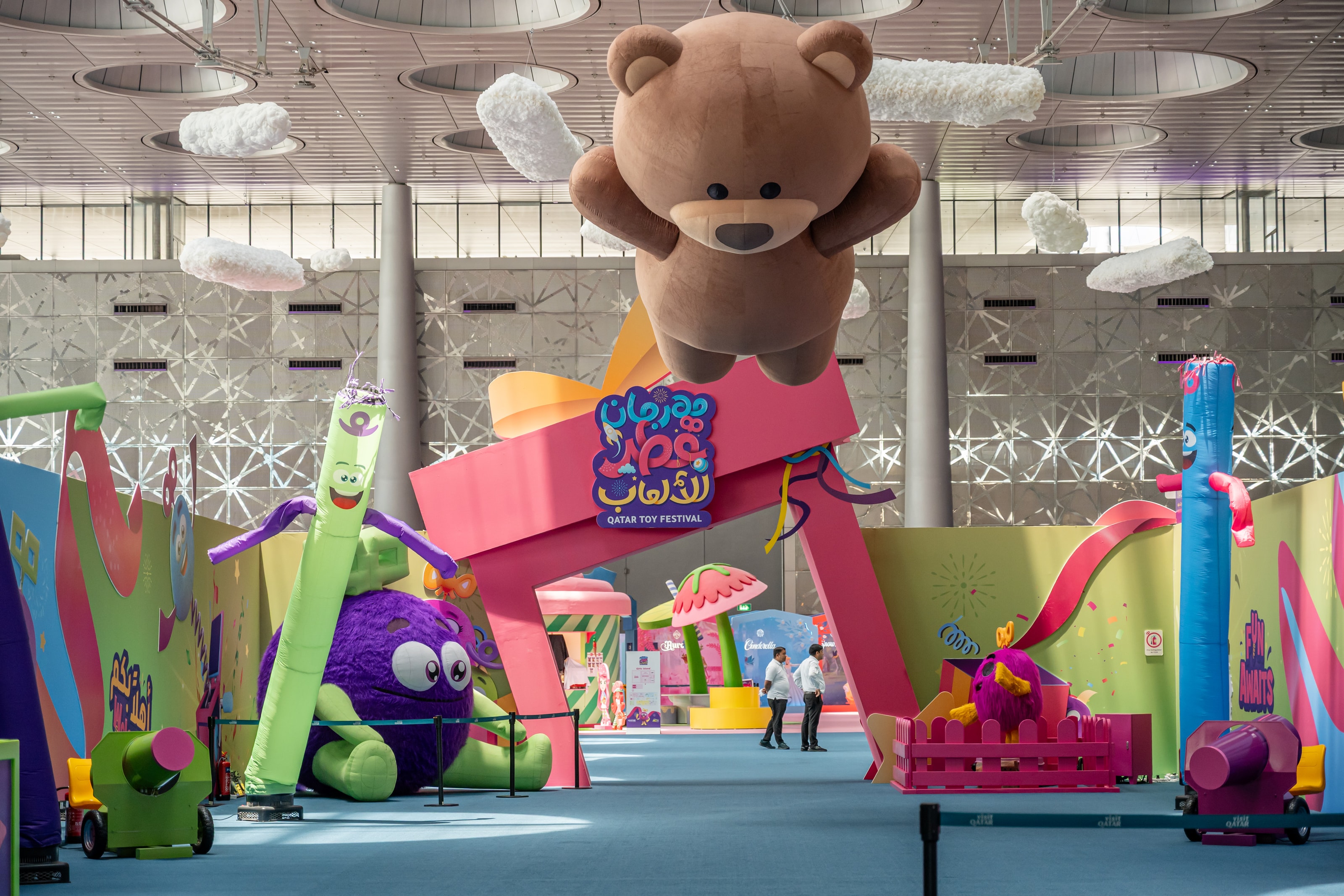 Teddy bear and character figures at a zone entrance