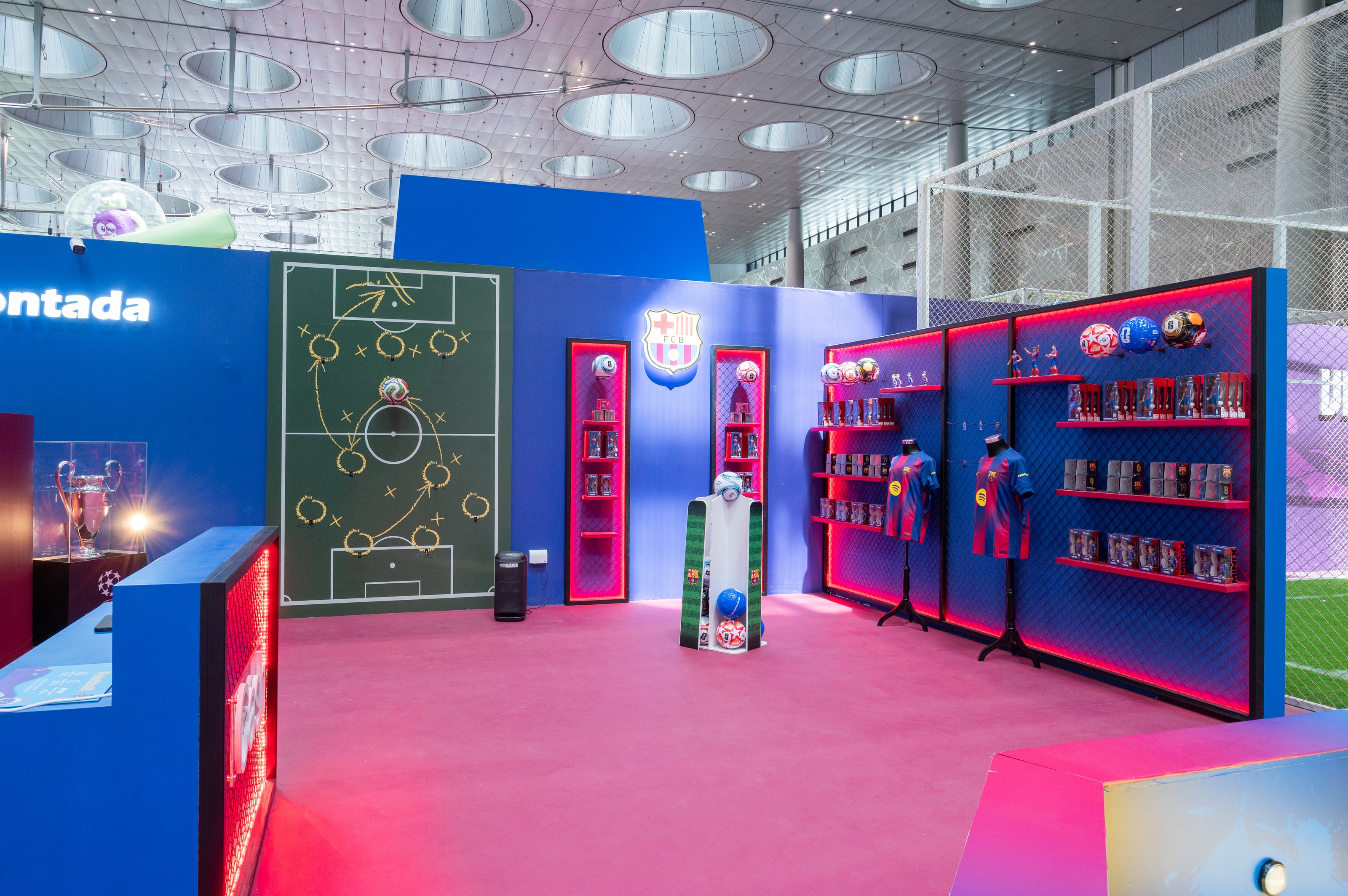 Barça merchandise wall in club colours