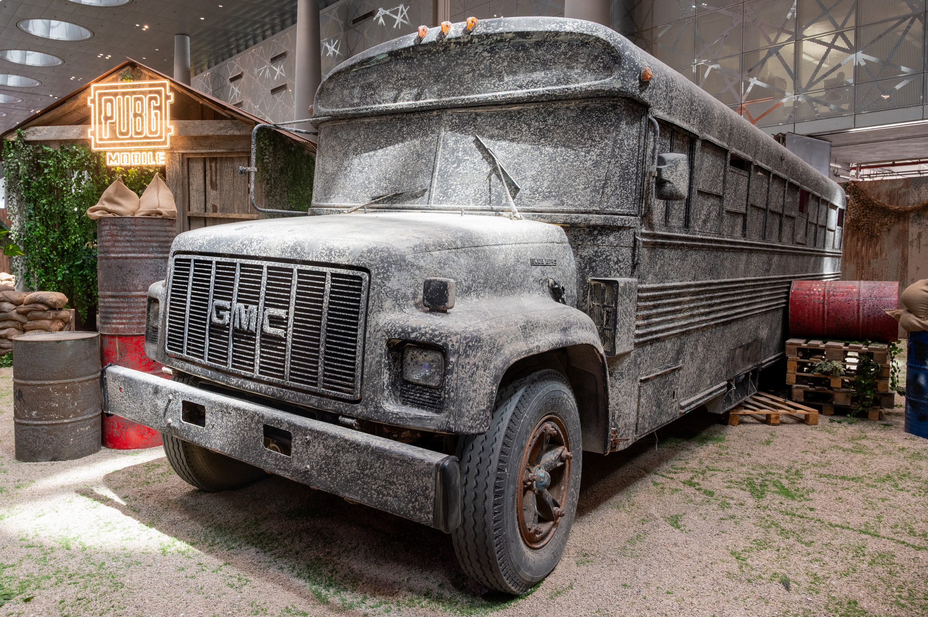 Weathered school bus set piece inside the PUBG Mobile zone