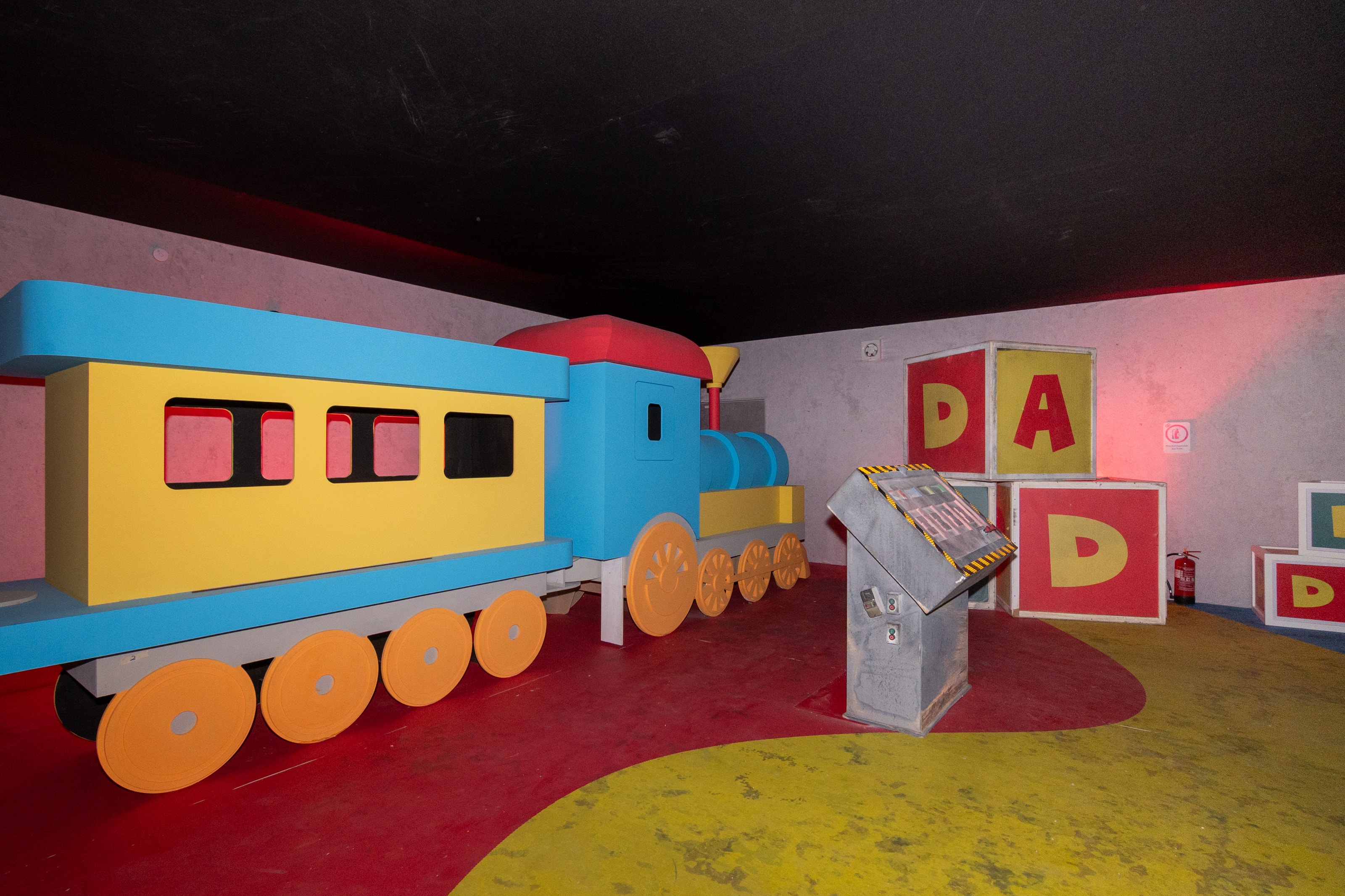 Toy-train room with giant alphabet blocks