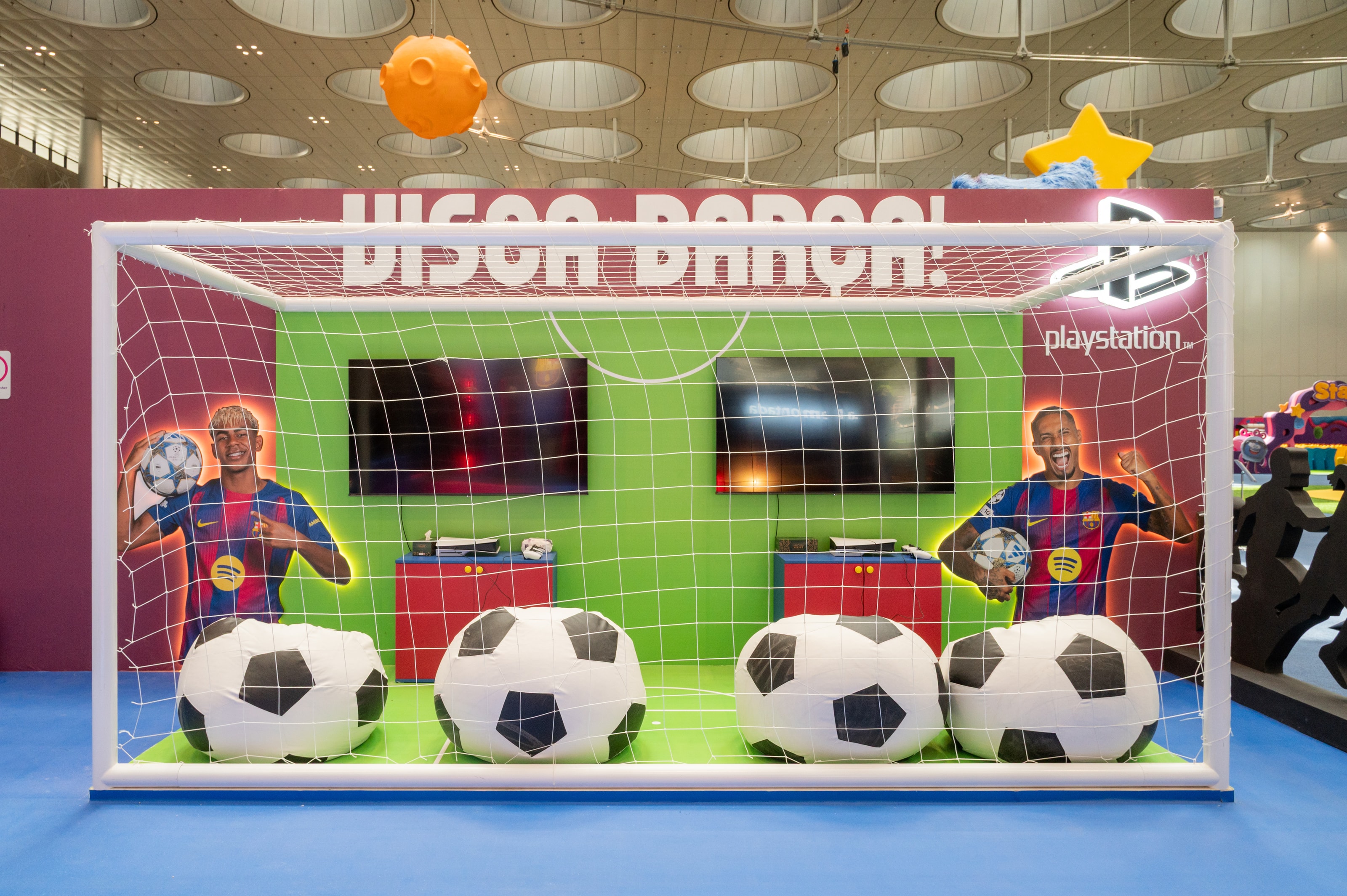 “Visca Barça” goal wall with oversized football seats