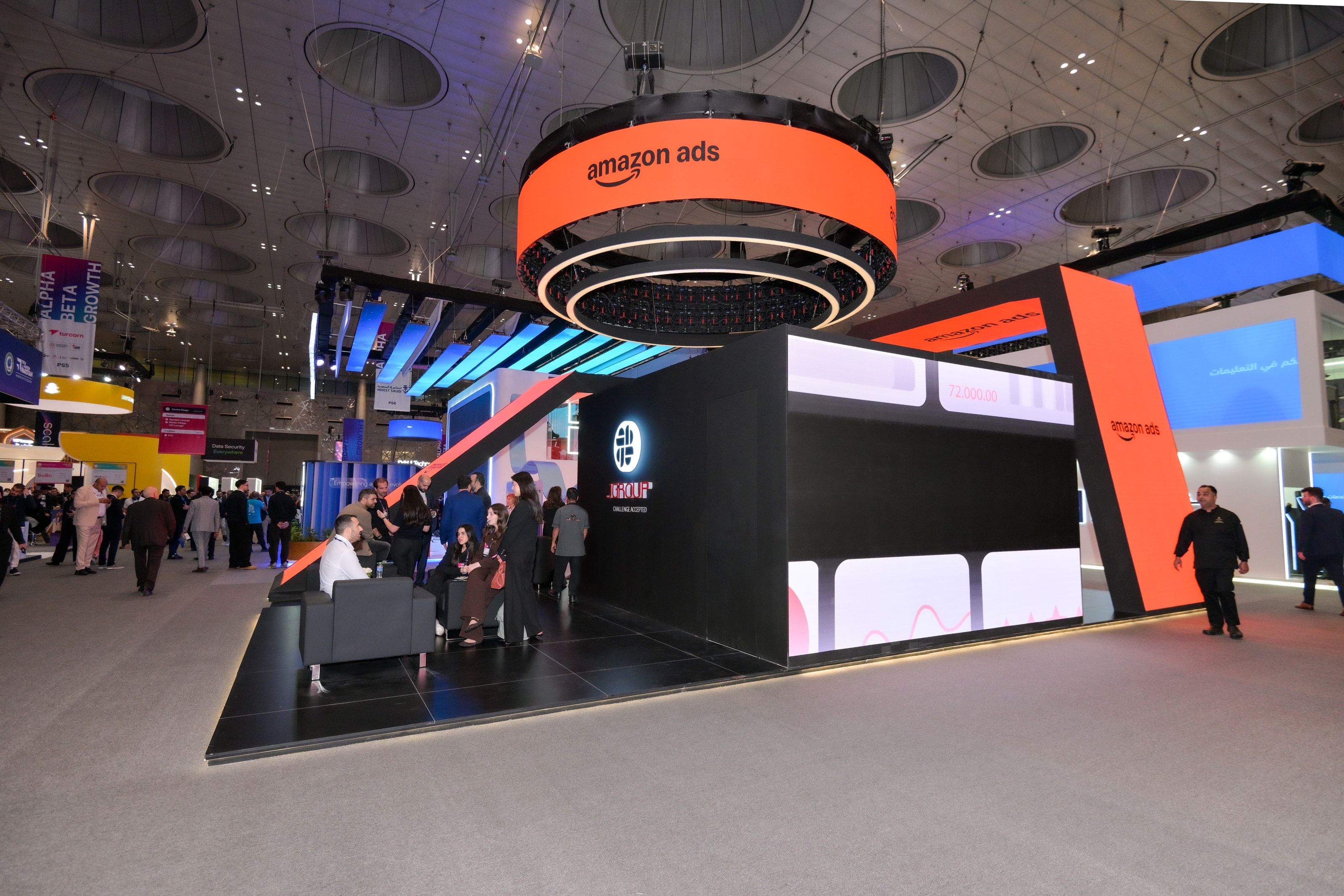 Amazon Ads halo sign above a black booth