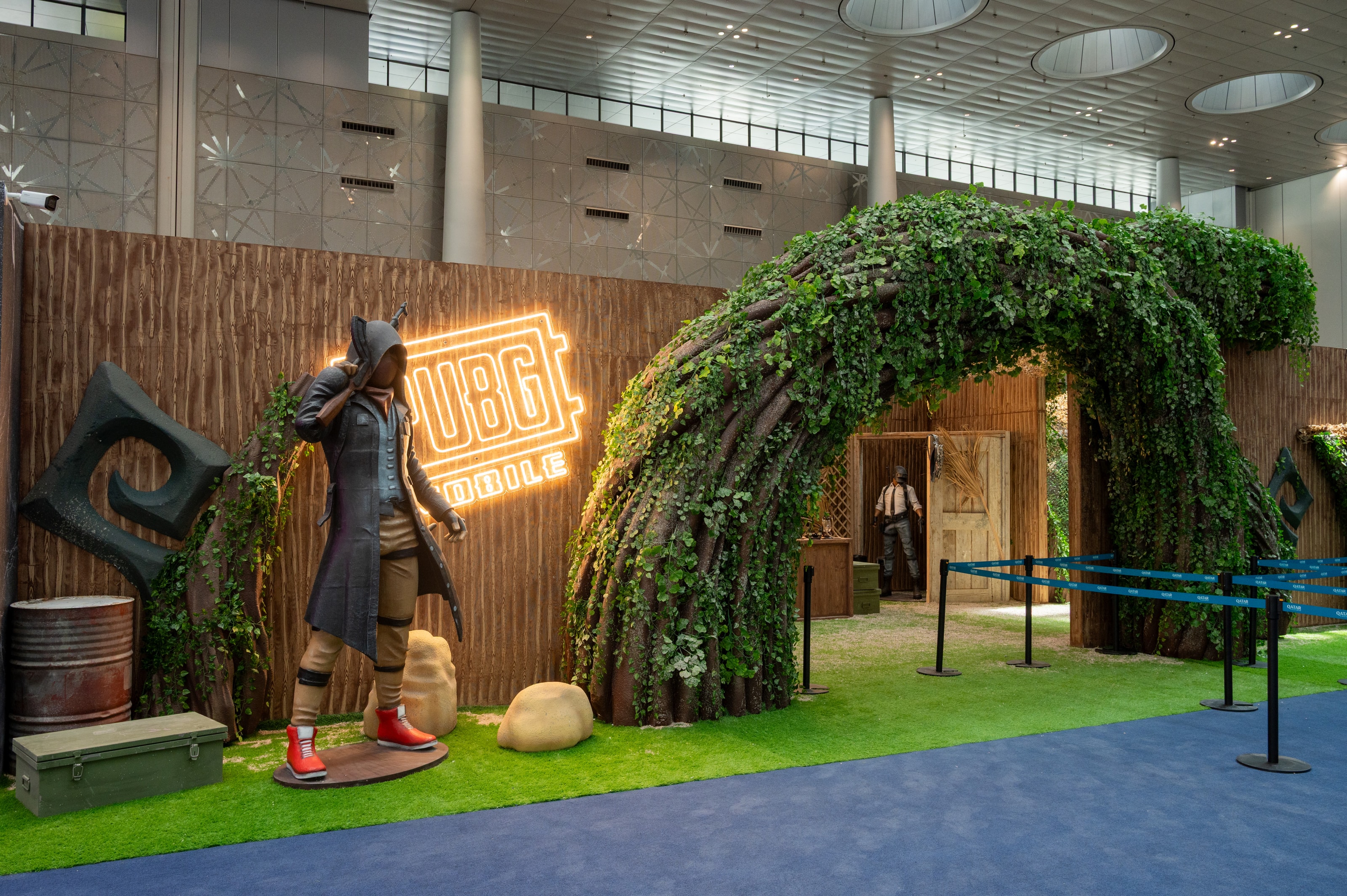 Ivy-covered arch marking the entrance to the PUBG Mobile zone